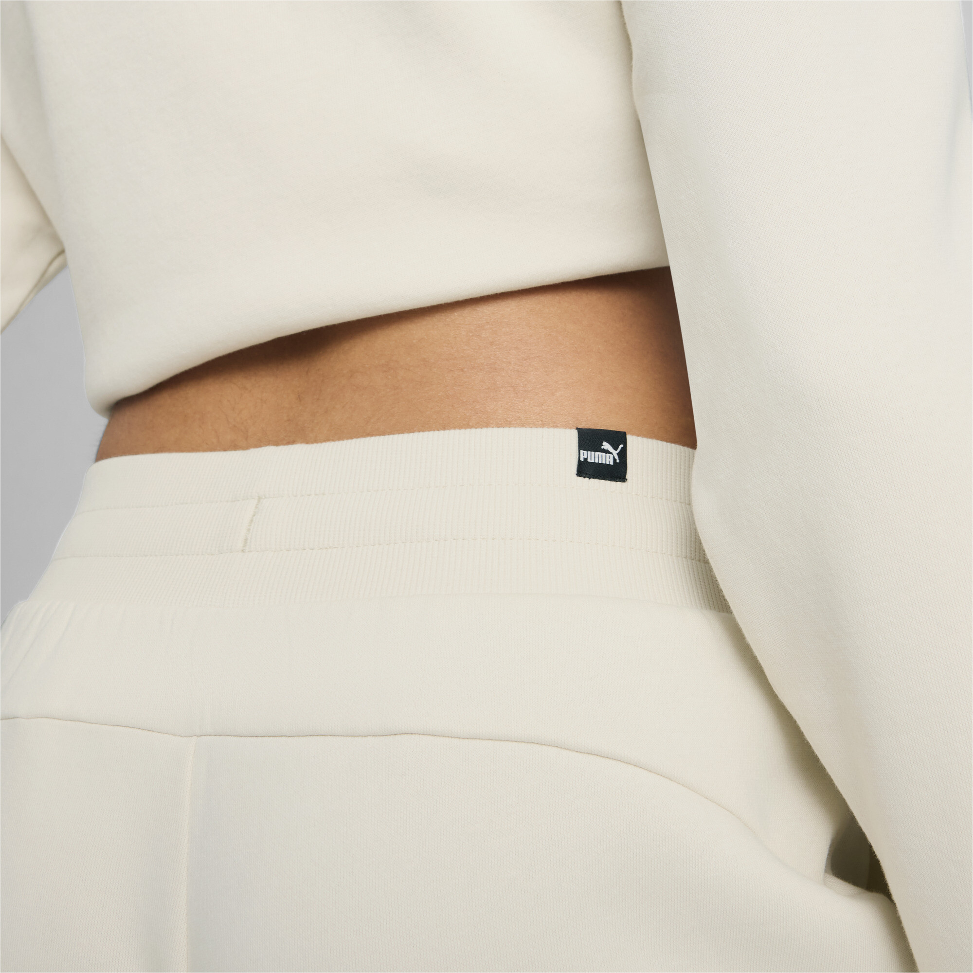 Puma ქალის შარვალი ESS+ Class Act Pants FL Alpine Snow