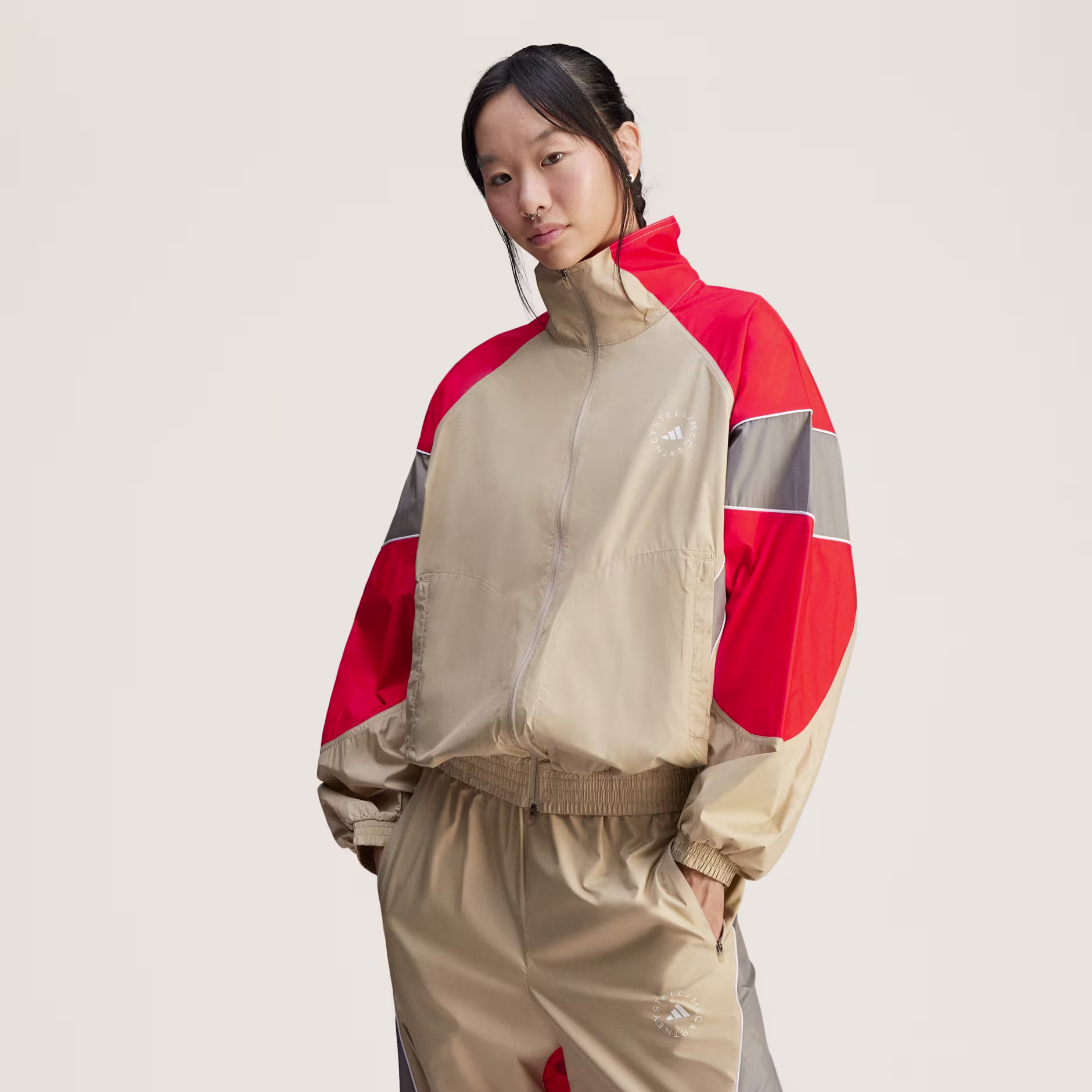 Adidas ქალის ჯემპრი aSMC TRACKTOP